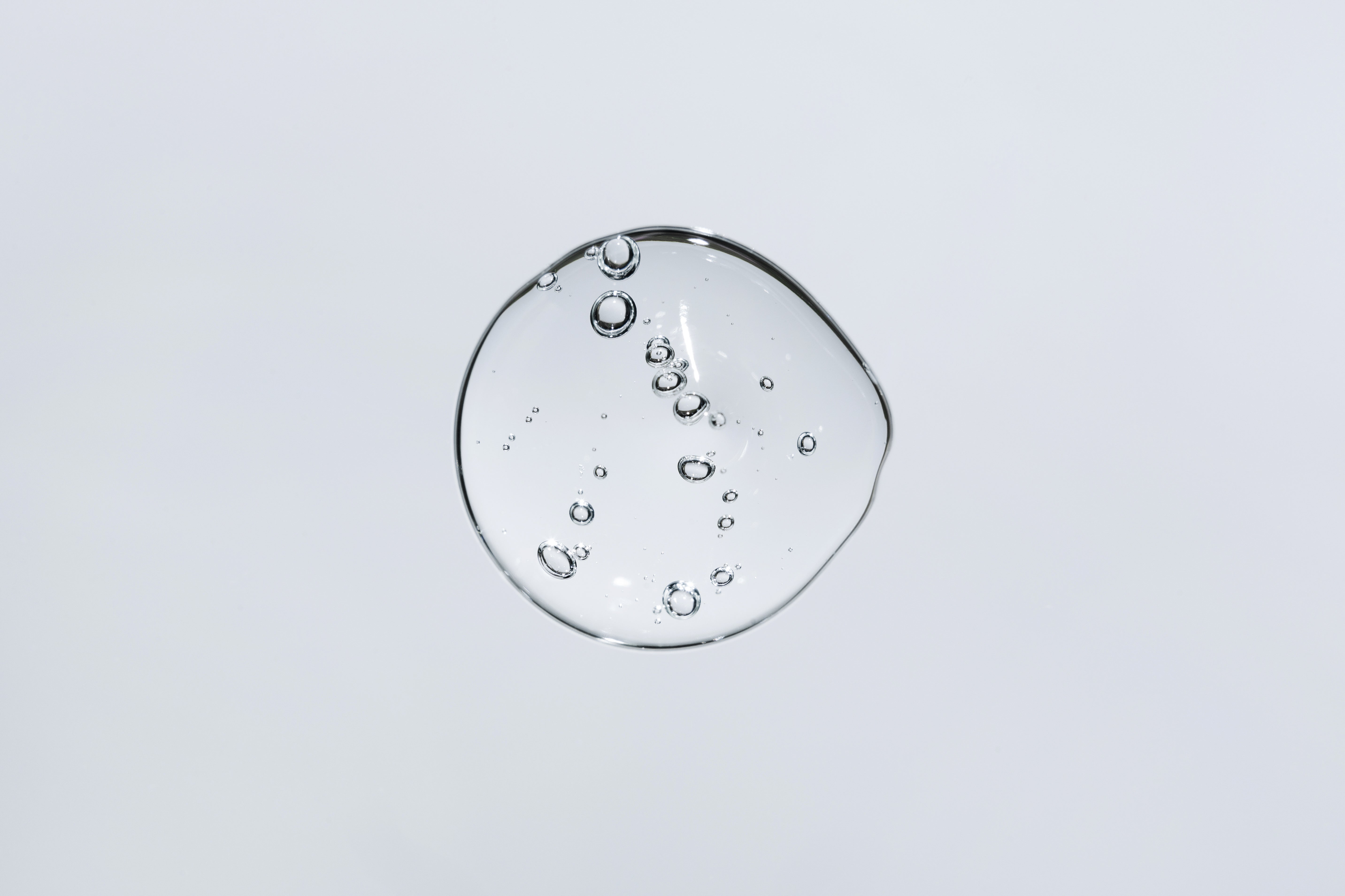 Bolla di acido ialuronico su sfondo chiaro