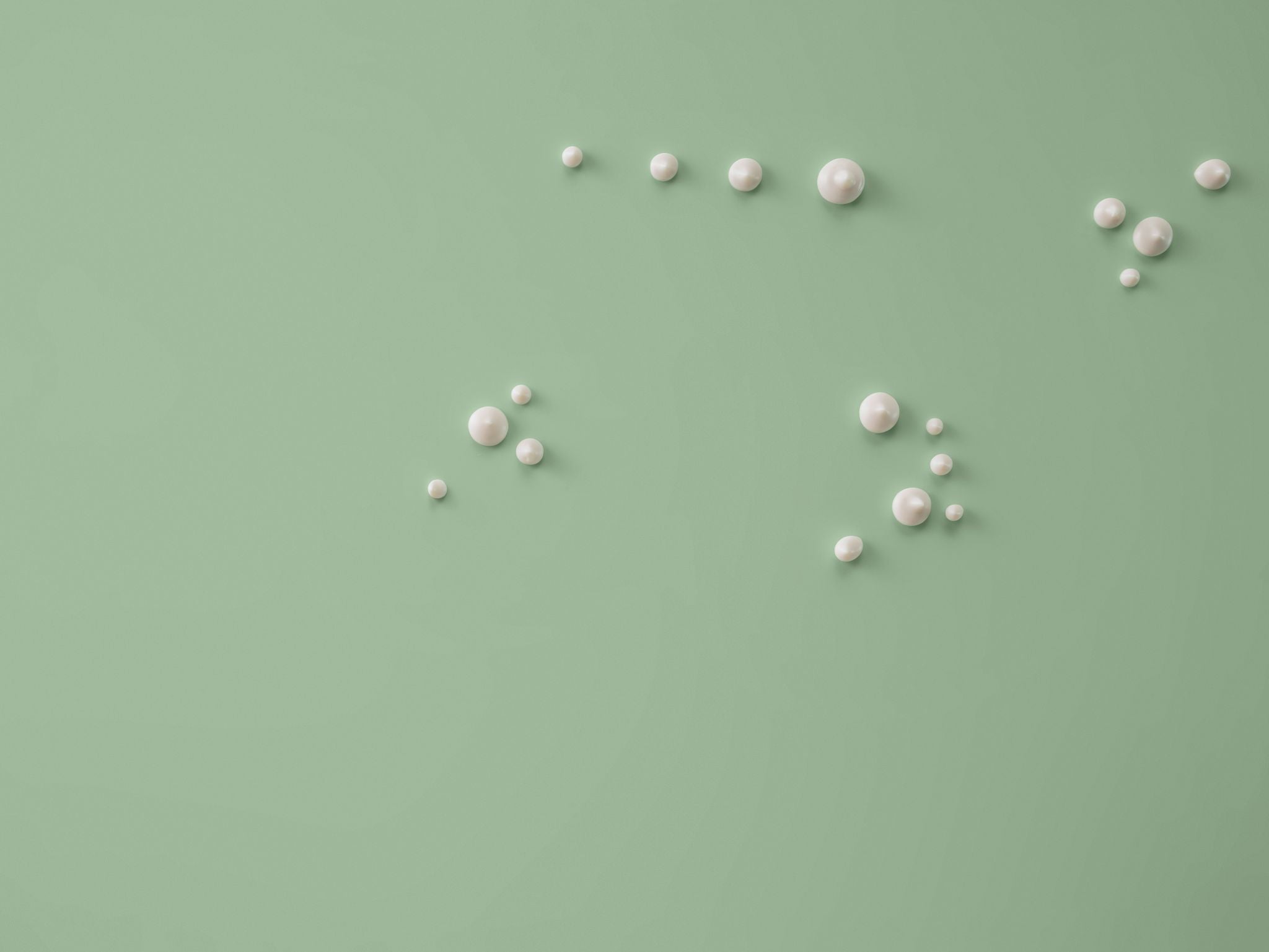 sfondo verde con gocce di crema